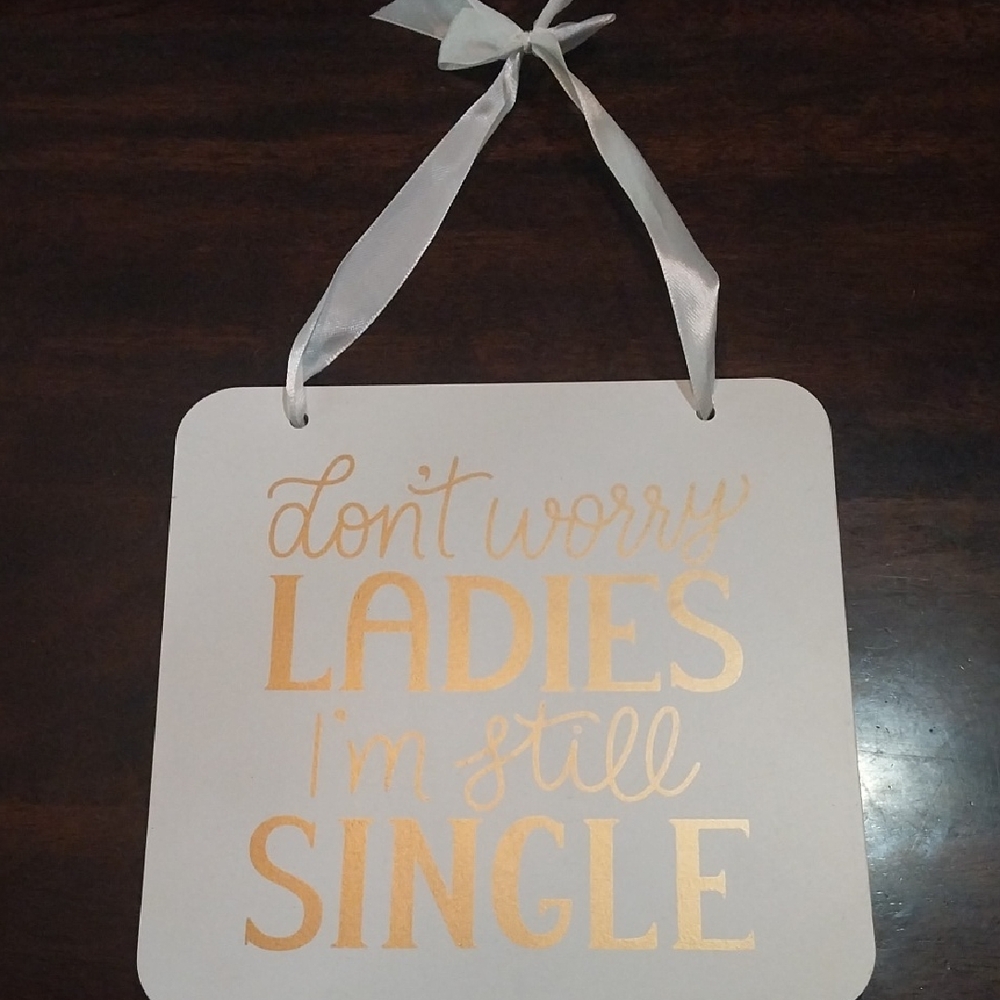 Gold and White Hanging Sign